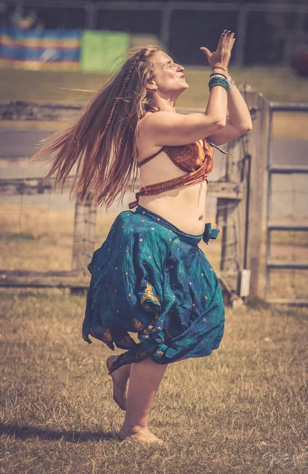Saz dancing barefoot at a festival